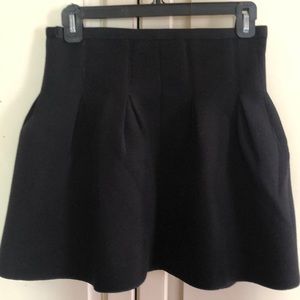 Black fleece like skirt with pleats